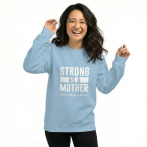a photo of a woman in a light blue sweatshirt