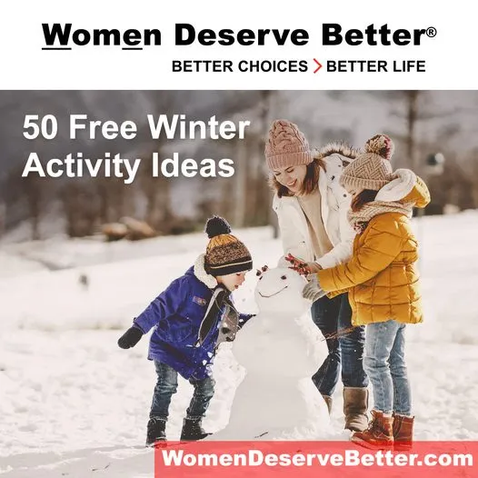 A family building a snowman